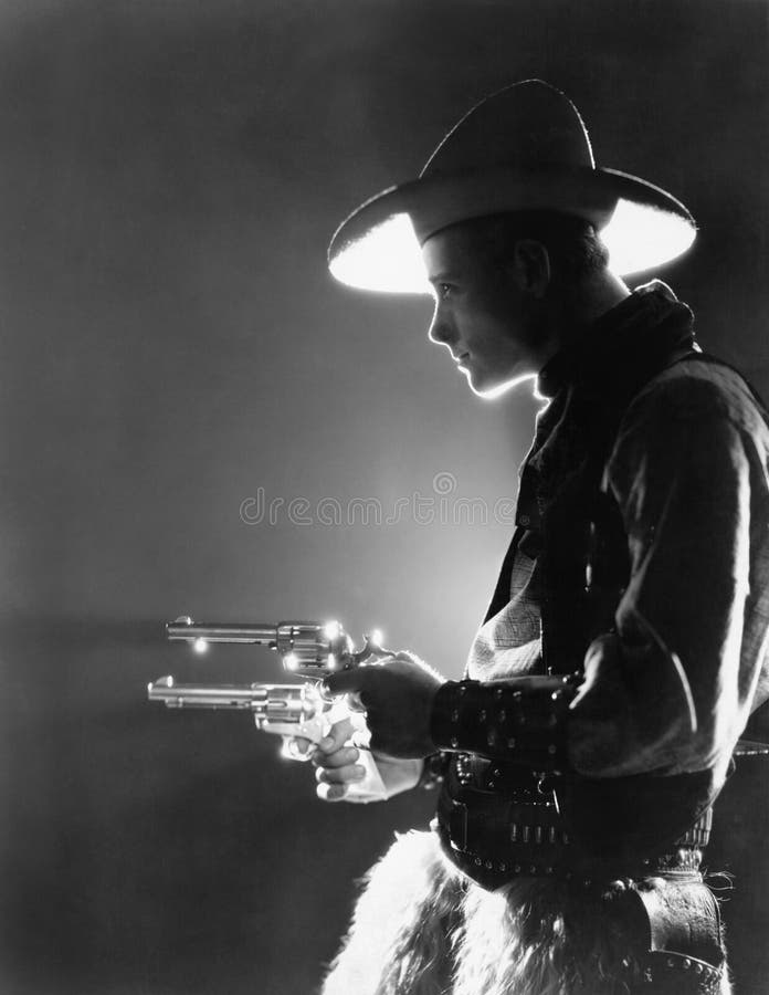 Profile of a young man holding guns