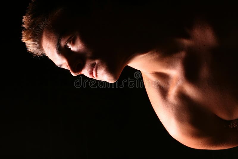 Profile of a young muscular ma