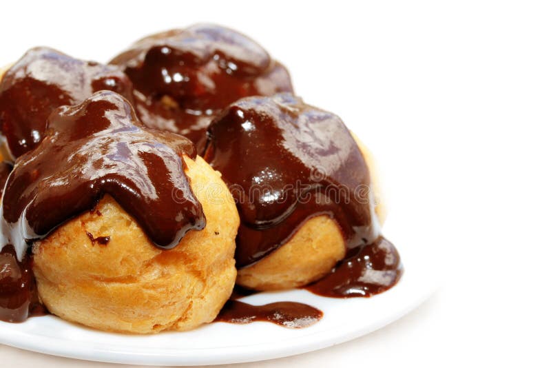 Profiteroles with Hot Chocolate Sauce. Stock Image Image of white
