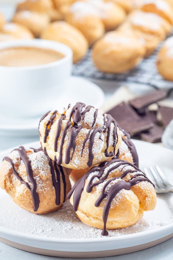 Profiteroles with Whipped Cream and Chocolate Filling, Covered with ...