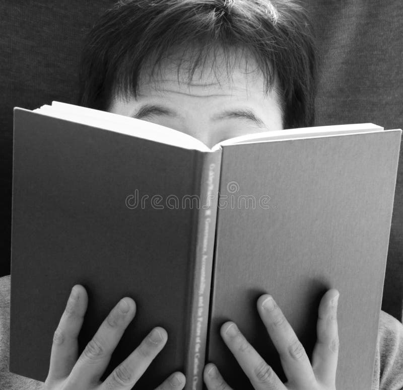 Person reading a book. Person reading a book