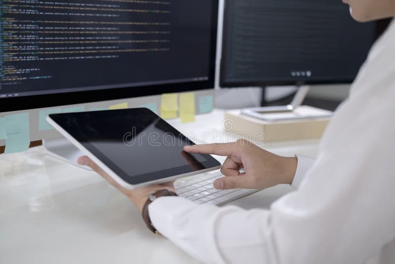 Programmer is coding and programming software. Software developer typing data code, working on project. Coding software development programming program code stock images, royalty-free photos and pictures
