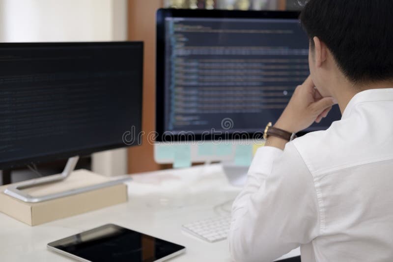 Programmer is coding and programming software. Software developer typing data code, working on project. Coding software development programming program code stock images, royalty-free photos and pictures