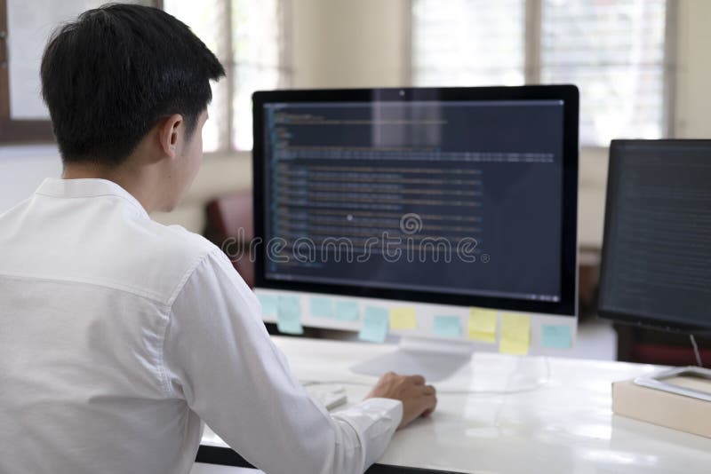Programmer is coding and programming software. Software developer typing data code, working on project. Coding software development programming program code stock images, royalty-free photos and pictures