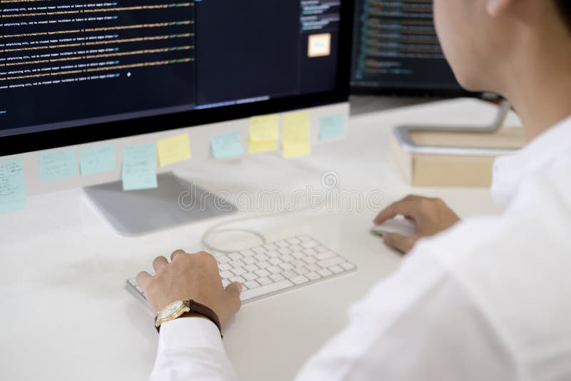 Programmer is coding and programming software. Software developer typing data code, working on project. Coding software development programming program code stock images, royalty-free photos and pictures
