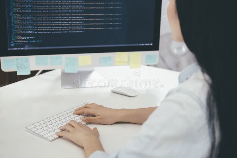 Programmer is coding and programming software. Software developer typing data code, working on project. Coding software development programming program code stock images, royalty-free photos and pictures