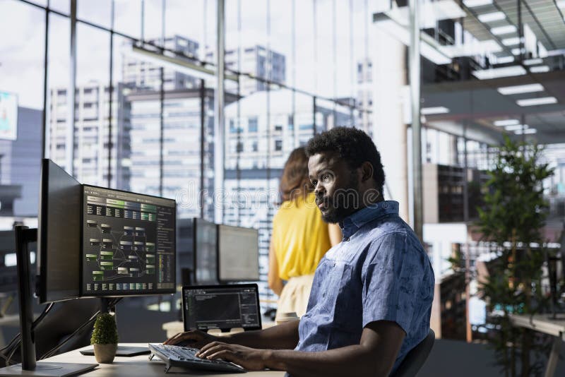 Programmer developing and maintaining machine learning APIs solving complex problems. Man training predictive models capable of handling tasks such as language processing and predictive analytics. Developing programmer stock images, royalty-free photos and pictures