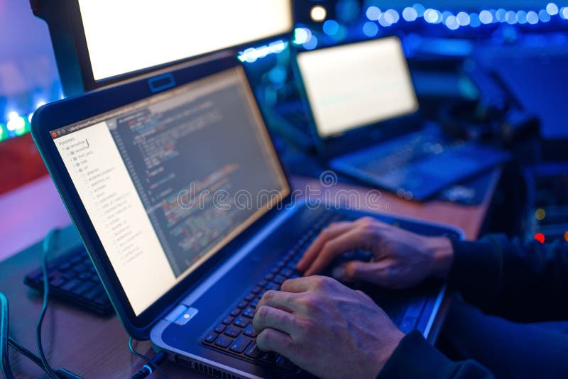 Programmer hands on keyboard, network security