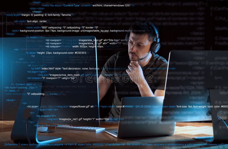 Programmer with headphones working in office royalty free stock photos