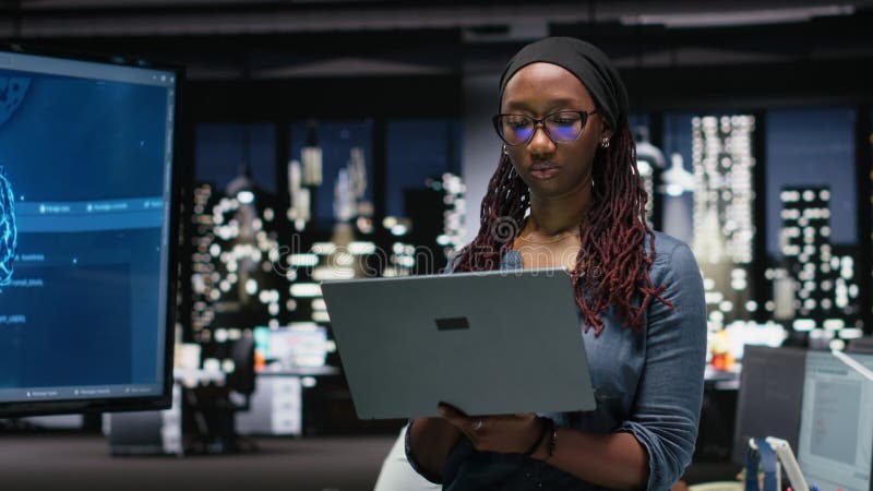 Programmer in office developing complex machine learning algorithms stock footage