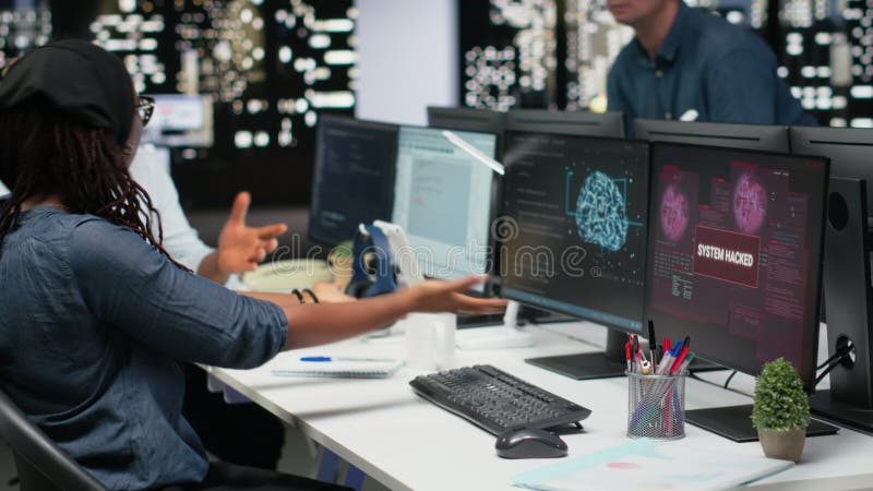 Programmer in office panicked by ddos attack from hacker stock video footage