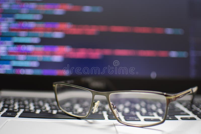 hval lettelse eksistens The Programmer`s Glasses Put on the Keyboard Laptop To Relax after Long  Coding for Application Creation and Website Design for Stock Photo - Image  of desk, desktop: 207334494