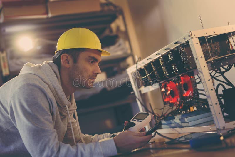 Setting up mining rig energy consumption royalty free stock photo