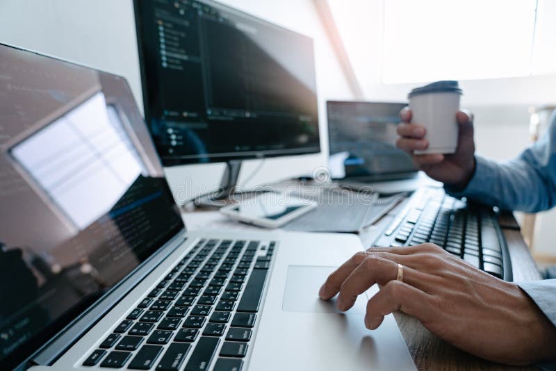Programmer Typing Code on desktop computer, Developing programation and coding technologies zdjęcie royalty free