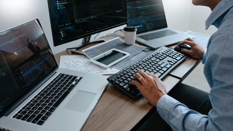 Programmer Typing Code on desktop computer, Developing programming and coding technologies concept. Coding software development programming program code stock images, royalty-free photos and pictures