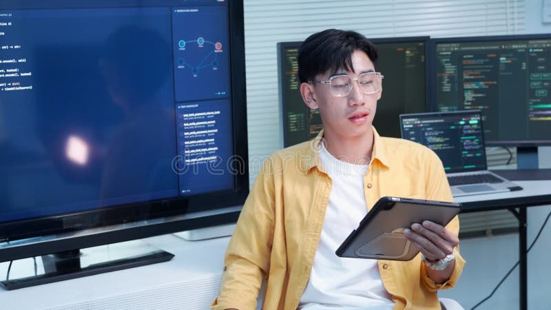 Programmer Using Tablet During Software Development stock video