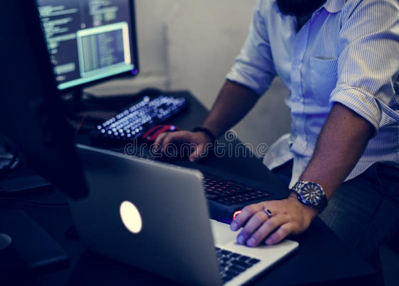 Programmer working on computer laptop royalty free stock photography