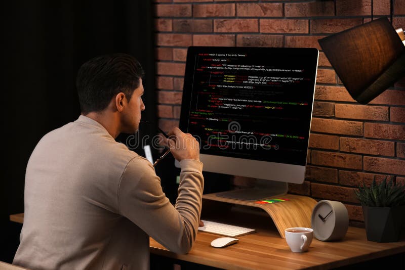 Programmer working with computer in office royalty free stock image