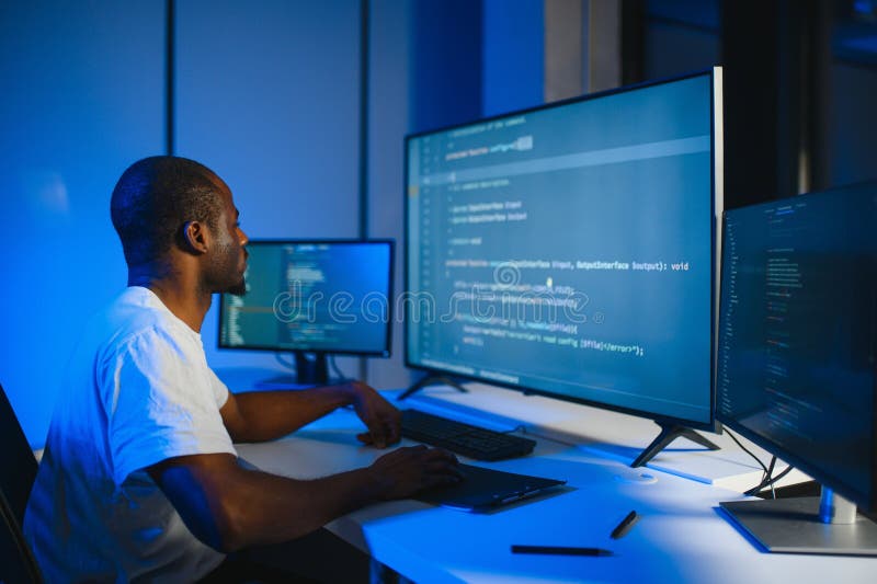 African american IT Programmer Working on Desktop Computer. royalty free stock photos