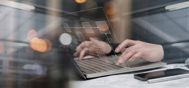 Programmer working on laptop with algorithm stock photos