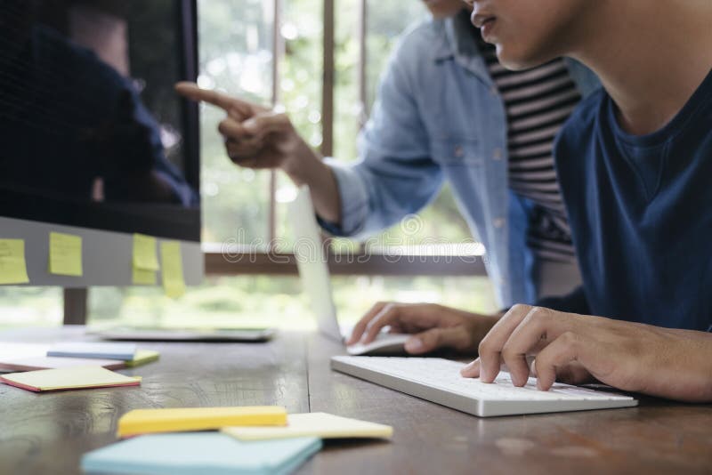 Programmers and developer teams are coding and developing software. Developing programming binary code stock images, royalty-free photos and pictures