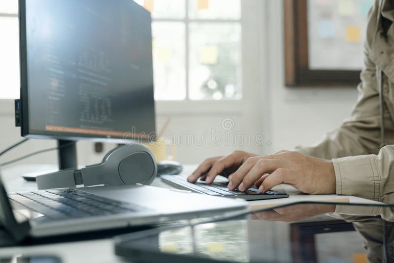 Programmers and developer teams are coding and developing software. Developing programming binary code stock images, royalty-free photos and pictures