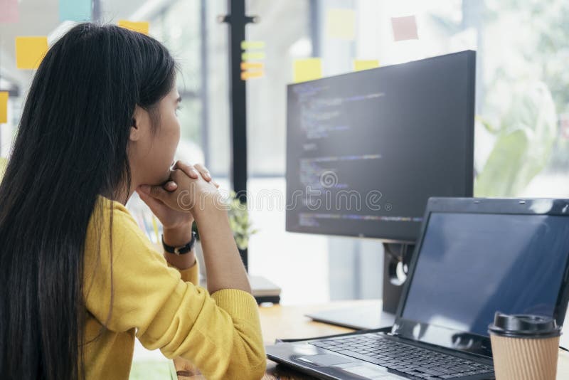 Programmers and developer teams are coding and developing software. royalty free stock image
