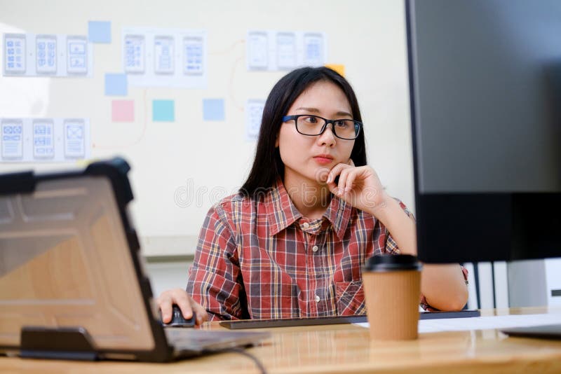 Programmers and developer teams are coding and developing software stock image