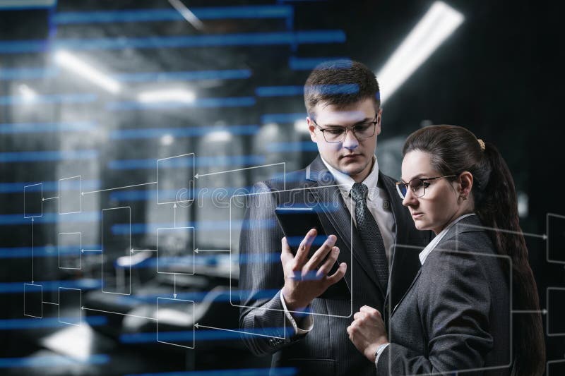 Programmers work in a team on a virtual screen royalty free stock photos