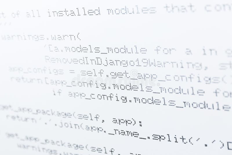Developer`s programming code printed on a white metal surface. Information technology background. Source code script stock images, royalty-free photos and pictures