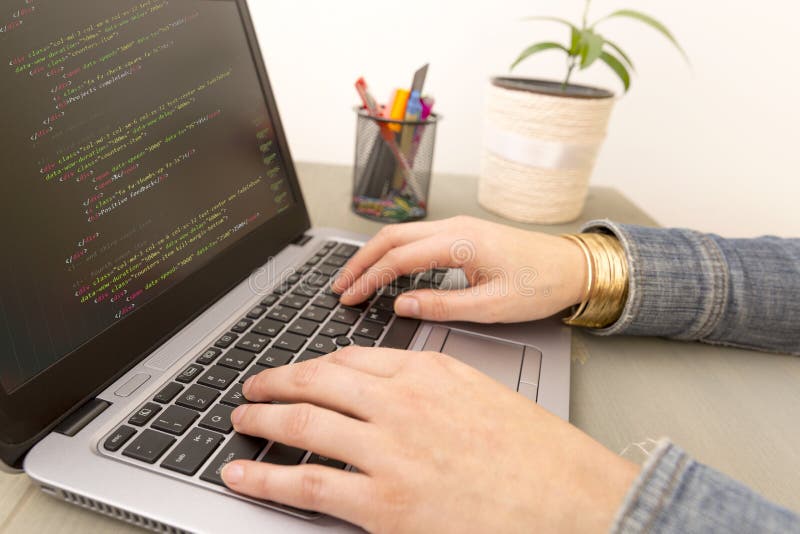 Programming Work Time. Programmer Typing New Lines of HTML Code. royalty free stock images Programming Work Time. Programmer Typing New Lines of HTML Code. royalty free stock images