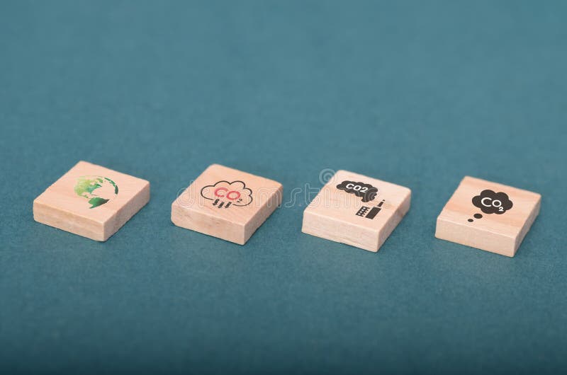 Progress of Climate Change: Wooden Blocks Illustrating Carbon Emissions and Global Impact. World climate change stock images, royalty-free photos and pictures