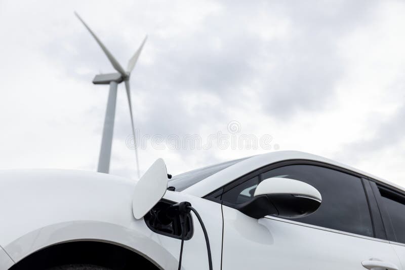 Progressive combination of EV car, charging station and wind turbine.