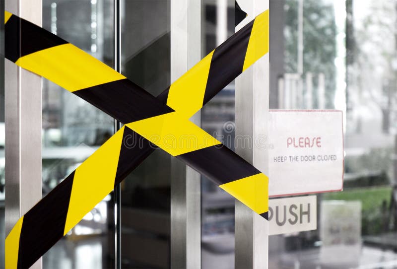 Prohibited closed room due to COVID-19 or coronavirus outbreak. Stay at home. Black and yellow stripes tapes. Restricted area sign