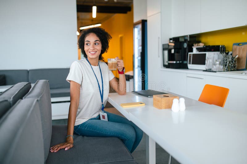 Project assistant with a badge having a lunch break royalty free stock image