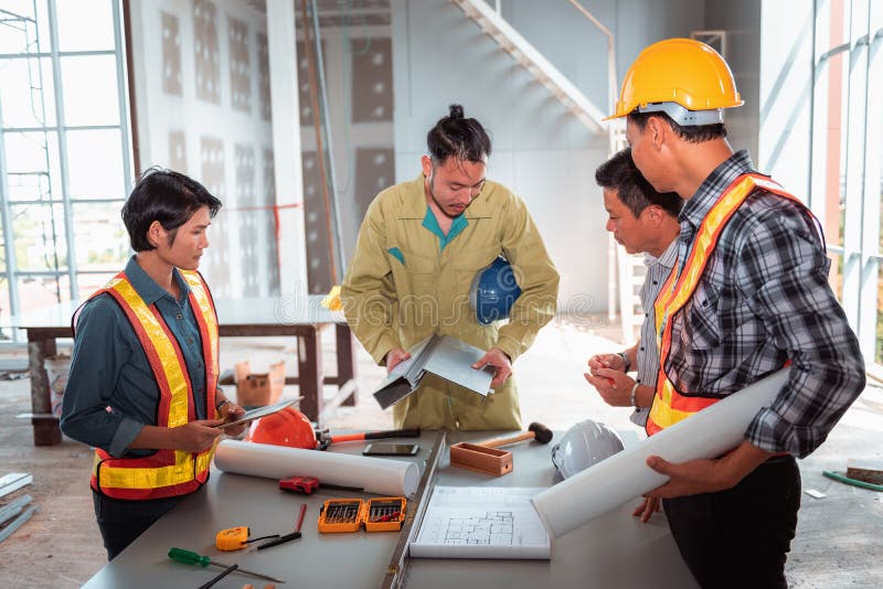 Project management team of engineers and architects planing brainstorming for new project., Business construction concept royalty free stock image Project management team of engineers and architects planing brainstorming for new project., Business construction concept royalty free stock image