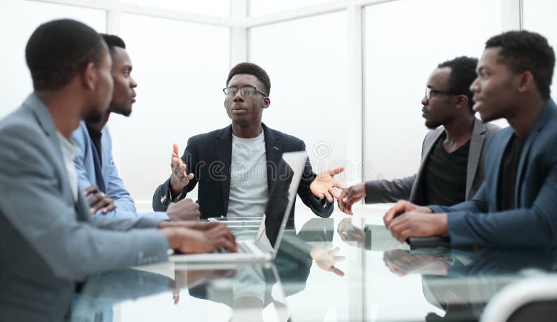 Project Manager Explaining Something To Employees at an Office Meeting  Stock Image - Image of diversity, discussing: 168454065