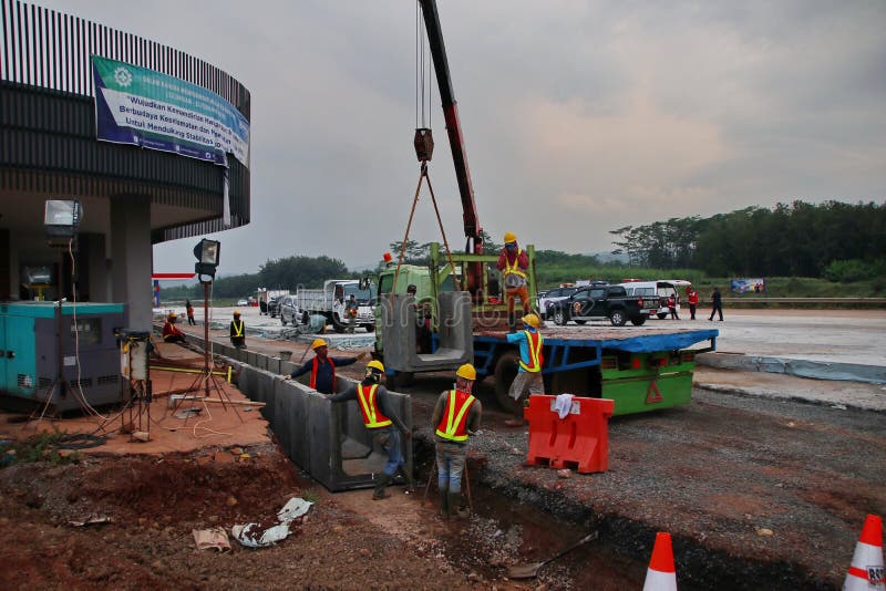 Project workers when handling waterways in the construction stock image Project workers when handling waterways in the construction stock image