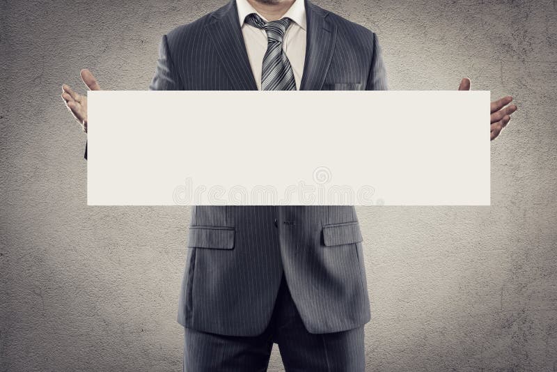 Propaganda do homem de negócios imagem de stock royalty free Propaganda do homem de negócios imagem de stock royalty free