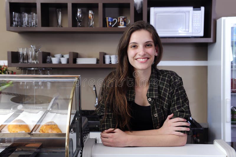 Proprietario di un caffè o di una cameriera di bar immagini stock