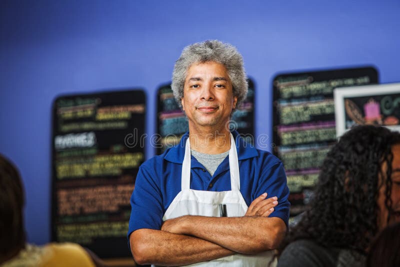 Propriétaire sûr de café photo stock Propriétaire sûr de café photo stock