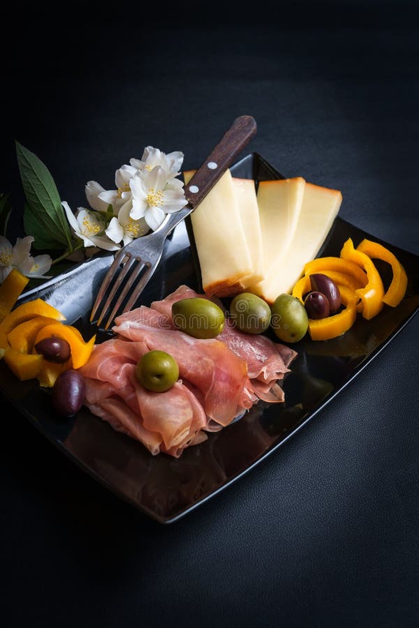 Platter of Prosciutto, Cheese and Olives Stock Photo Image of
