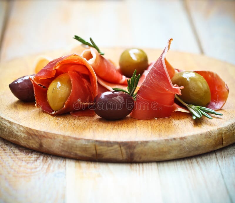 Prosciutto with Olives and Rosemary Stock Image Image of restaurant, meat 34624651