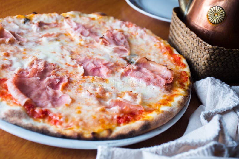Prosciutto Pizza. Neapolitan Pizza with Tomato Sauce, Cheese and