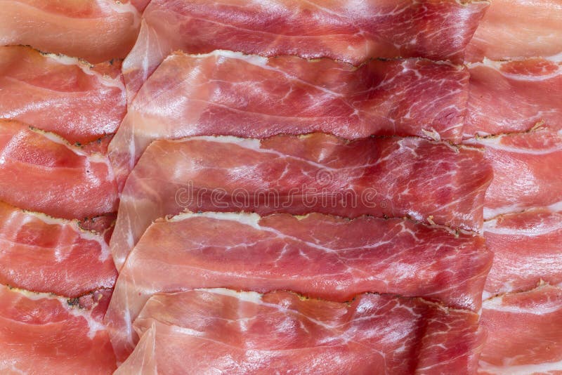 Prosciutto top view as background structure royalty free stock image