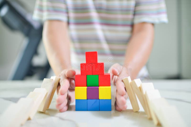Protect the house from falling over the wooden blocks.