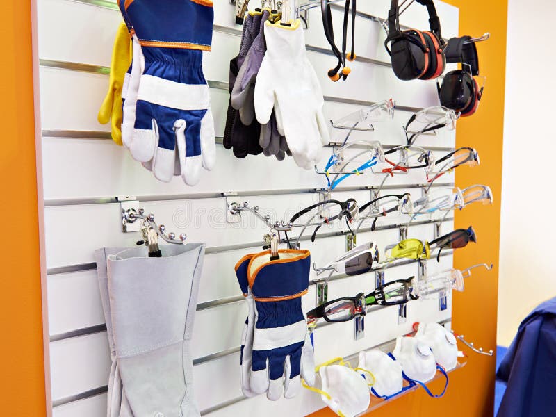 Protecteur de lunettes, gants et écouteurs pour le travail photographie stock Protecteur de lunettes, gants et écouteurs pour le travail photographie stock