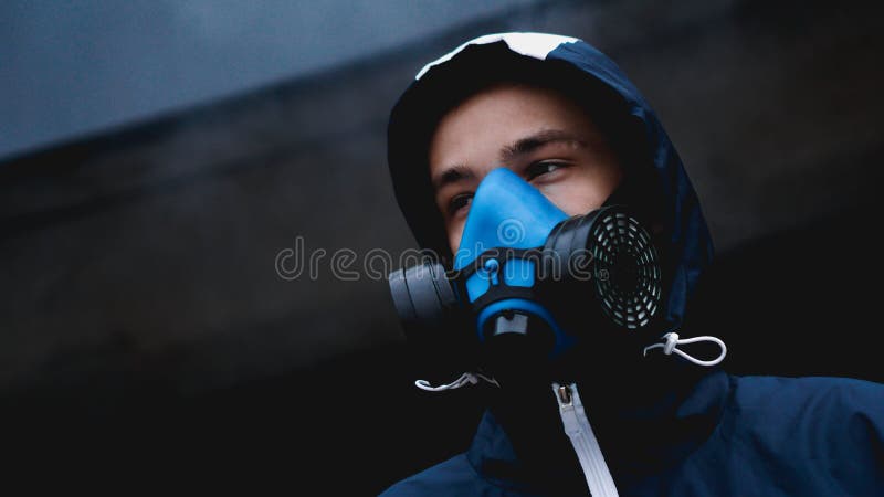 Protection respirator half mask for toxic gas. The man prepare to wear protection air pollution in the chemical industry royalty free stock photo Protection respirator half mask for toxic gas. The man prepare to wear protection air pollution in the chemical industry royalty free stock photo