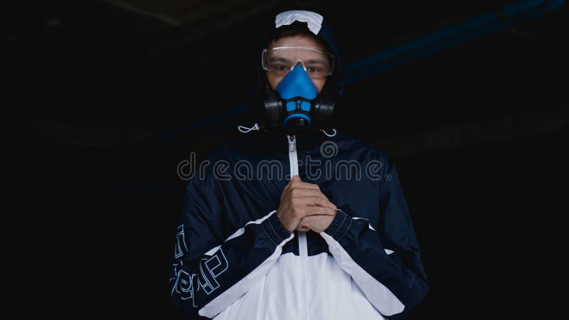 Protection respirator half mask for toxic gas. The man prepare to wear protection air pollution in the chemical industry stock image Protection respirator half mask for toxic gas. The man prepare to wear protection air pollution in the chemical industry stock image