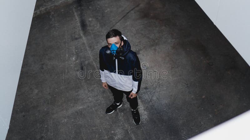 Protection respirator half mask for toxic gas. The man prepare to wear protection air pollution in the chemical industry. View from above stock images Protection respirator half mask for toxic gas. The man prepare to wear protection air pollution in the chemical industry. View from above stock images